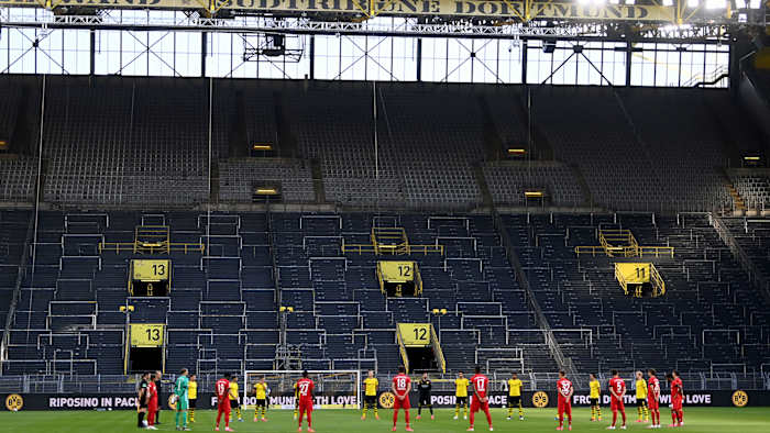 Borussia Dortmund and Bayern Munich observe a moment of silence